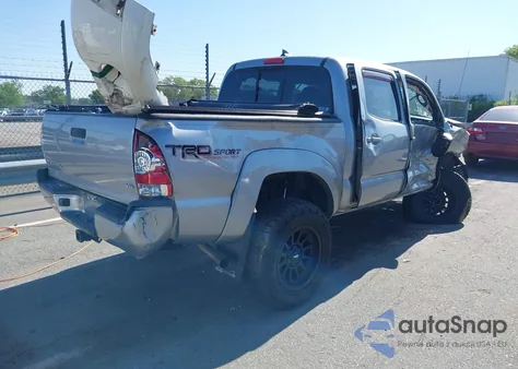 2015 Toyota Tacoma Base V6 z USA, uszkodzony, nr VIN 3TMLU4EN1FM185873